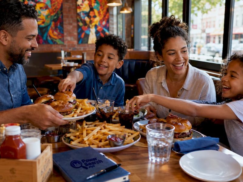 Family dining together in Italian restaurant