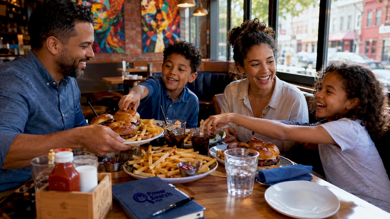 Family dining together in Italian restaurant