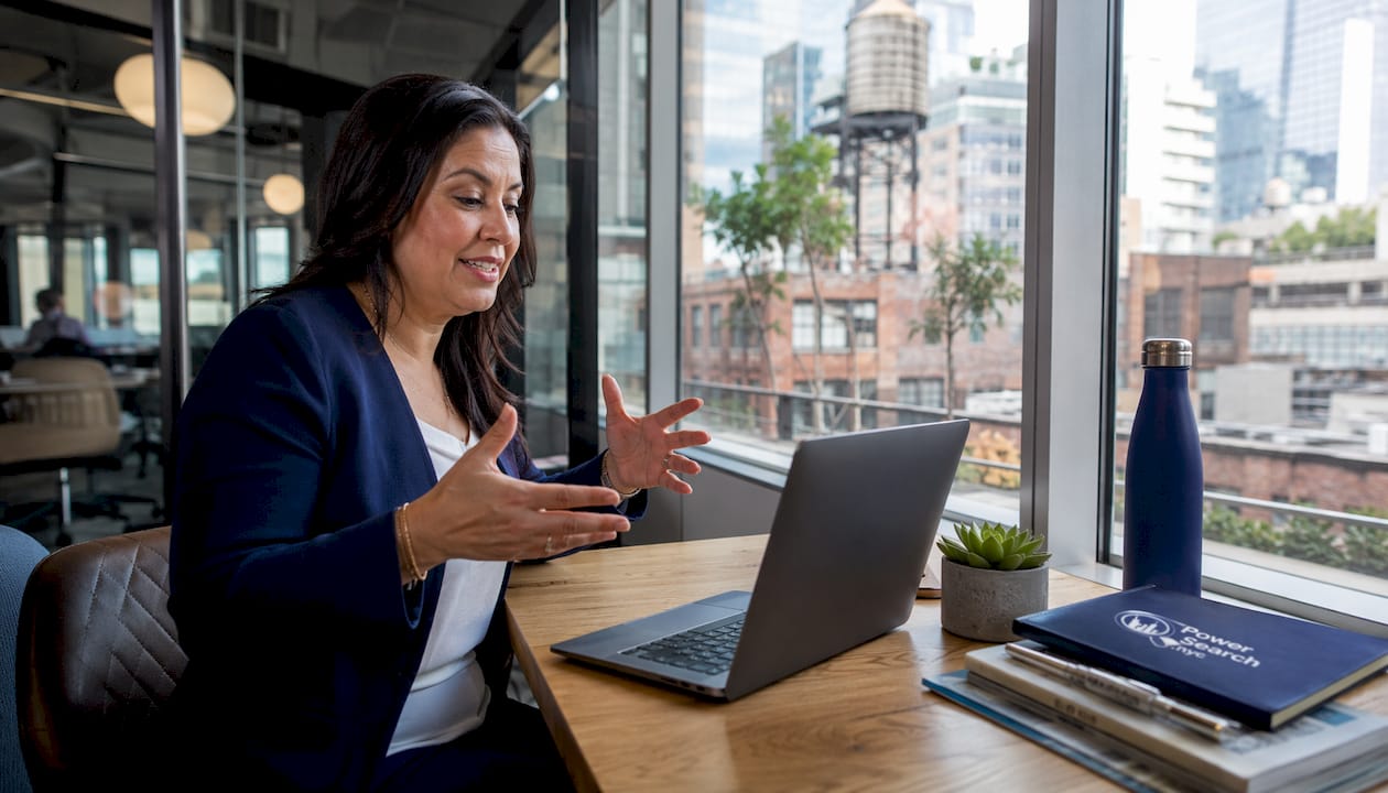 Travel agent advising client on NYC upsell options