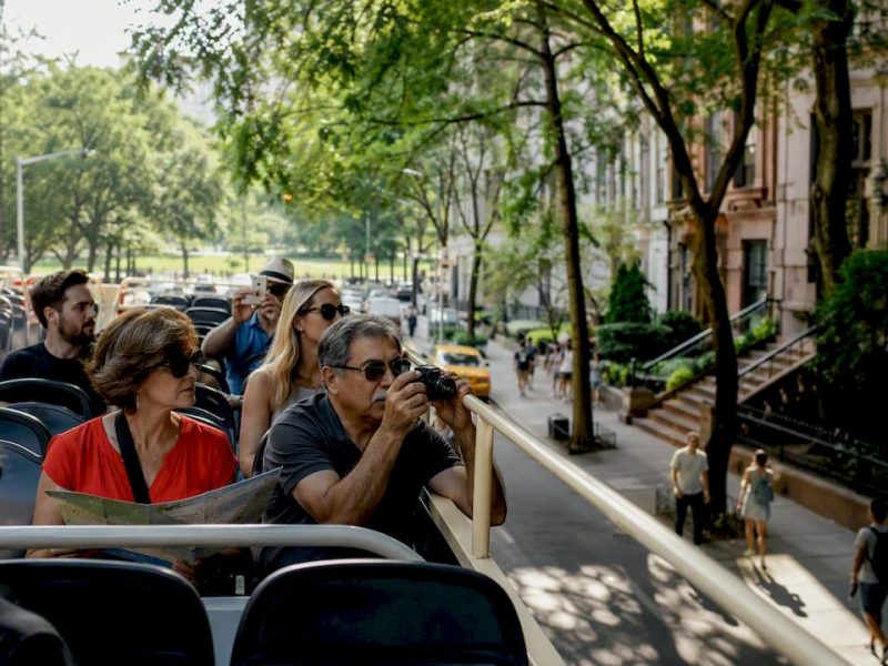 Open-top double-decker bus on NYC street